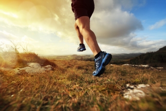 Outdoor cross-country running in early sunrise concept for exerc